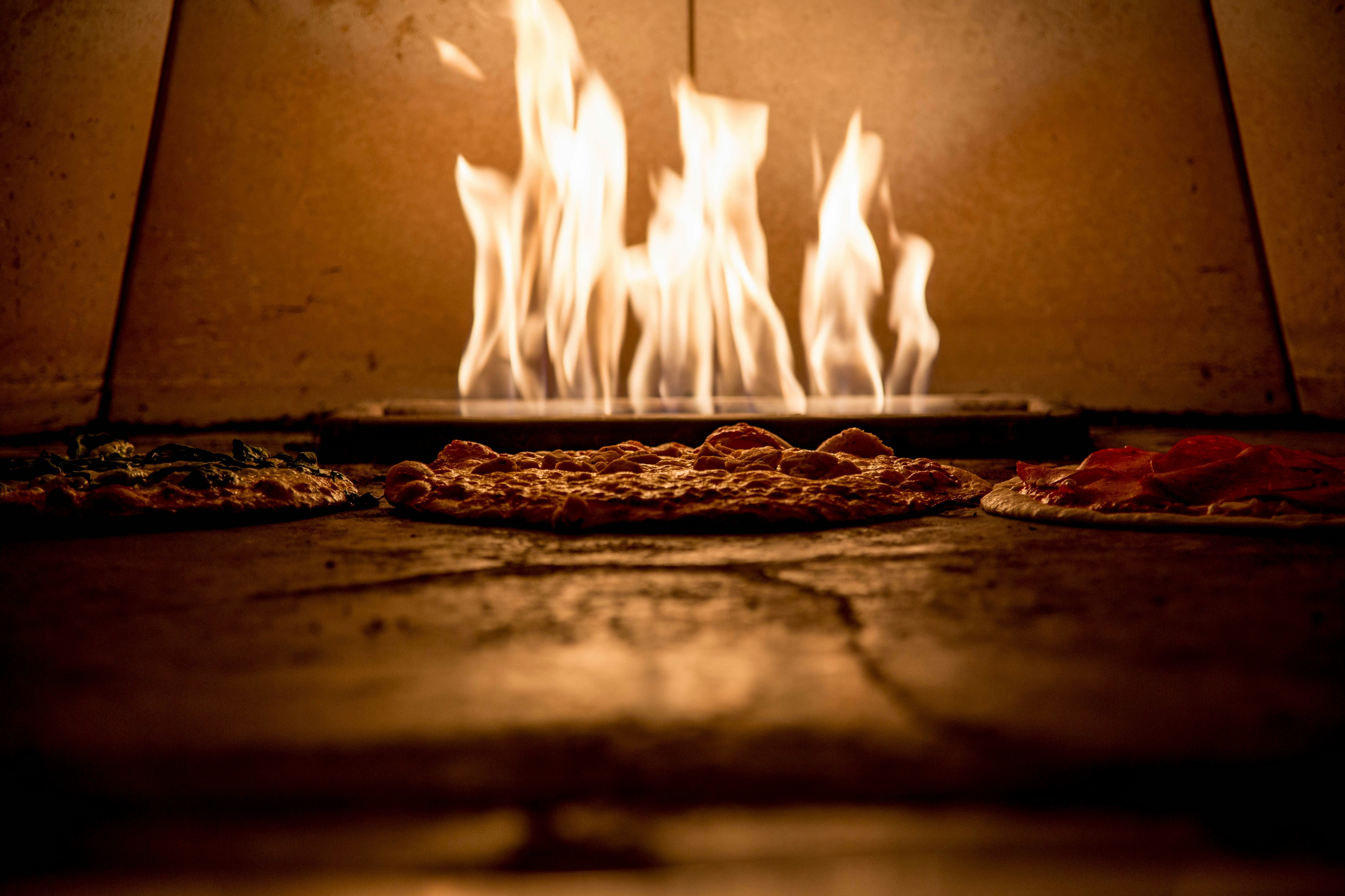 Outdoor Pizza Oven Buyer's Guide: Ooni vs. Gozney vs. Big Green Egg